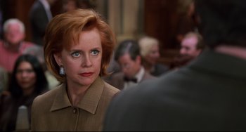 Movie still from “Liar Liar” (1997), directed by Tom Shadyac – An older woman is looking into the distance; Close Up shot, Over the shoulder angle