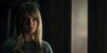 Movie still from “Locke & Key” (2020), created by Carlton Cuse – A woman with long blonde hair wearing a gray sweater; Close Up shot, Over the shoulder angle