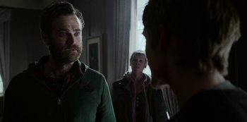 Movie still from “Black Summer” (2019), created by John Hyams – A man and a woman looking at each other in front of a mirror; Close Up shot, Over the shoulder angle