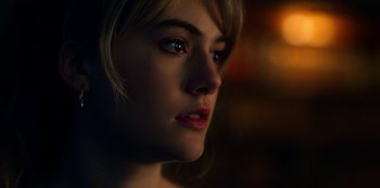 Movie still from “Locke & Key” (2020), created by Carlton Cuse – A woman's face in the dark; Close Up shot, Over the shoulder angle