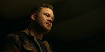 Movie still from “Locke & Key” (2020), created by Carlton Cuse – A person wearing a jacket; Close Up shot, Low angle