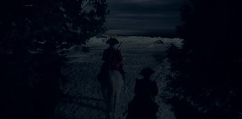 Movie still from “Locke & Key” (2020), created by Carlton Cuse – Two people on horseback riding through the snow at night; Extreme Wide shot, High angle