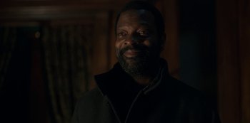 Movie still from “Locke & Key” (2020), created by Carlton Cuse – A man with a beard is smiling for the camera; Close Up shot, Low angle