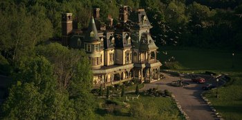 Movie still from “Locke & Key” (2020), created by Carlton Cuse – An aerial view of an old mansion in the middle of the day; Extreme Wide shot, High angle