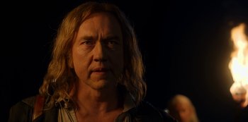 Movie still from “Locke & Key” (2020), created by Carlton Cuse – A person with long blonde hair; Close Up shot, Over the shoulder angle