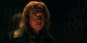 Movie still from “Locke & Key” (2020), created by Carlton Cuse – A person with long blonde hair; Close Up shot, Over the shoulder angle