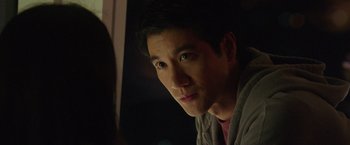 Movie still from “Blackhat” (2015), directed by Michael Mann – A person looking at the camera; Close Up shot, Over the shoulder angle