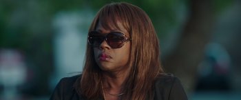 Movie still from “Blackhat” (2015), directed by Michael Mann – A person wearing sunglasses; Close Up shot, Over the shoulder angle