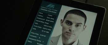 Movie still from “Blackhat” (2015), directed by Michael Mann – A man's picture is displayed on a computer screen; Extreme Close Up shot, High angle