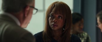 Movie still from “Blackhat” (2015), directed by Michael Mann – A woman is looking at a man in a room; Close Up shot, Over the shoulder angle