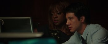 Movie still from “Blackhat” (2015), directed by Michael Mann – A man and a woman are looking at a laptop computer; Close Up shot, Over the shoulder angle