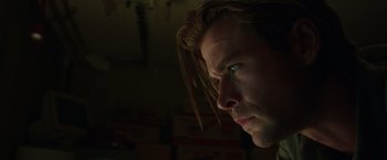 Movie still from “Blackhat” (2015), directed by Michael Mann – A person with long brown hair; Close Up shot, Low angle