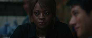 Movie still from “Blackhat” (2015), directed by Michael Mann – A person wearing a black shirt; Close Up shot, Over the shoulder angle