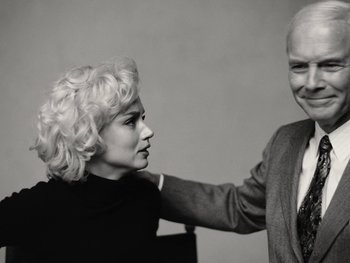 Movie still from “Blonde” (2022), directed by Andrew Dominik – An old photo of a man and a woman; Medium shot, Low angle