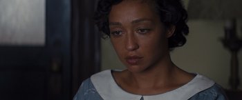 Movie still from “Loving” (2016), directed by Jeff Nichols – A person wearing a dress; Close Up shot, High angle