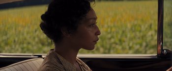 Movie still from “Loving” (2016), directed by Jeff Nichols – A woman sitting in a car looking out the window; Close Up shot, Over the shoulder angle
