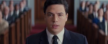 Movie still from “Loving” (2016), directed by Jeff Nichols – A person wearing a suit and tie; Close Up shot, High angle