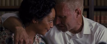 Movie still from “Loving” (2016), directed by Jeff Nichols – A man and a woman looking at one another's face; Close Up shot, High angle