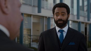 Movie still from “Marcella” (2016), created by Hans Rosenfeldt – A man in a suit and a tie; Close Up shot, Over the shoulder angle