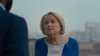 Movie still from “Marcella” (2016), created by Hans Rosenfeldt – An older woman is looking at the camera; Close Up shot, Over the shoulder angle