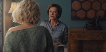 Movie still from “Marcella” (2016), created by Hans Rosenfeldt – Two women are talking in a living room; Medium shot, Over the shoulder angle