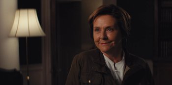 Movie still from “Marcella” (2016), created by Hans Rosenfeldt – A person wearing a jacket; Close Up shot, Over the shoulder angle