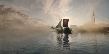 Movie still from “One Piece” (2023), directed by Marc Jobst – A sail boat floating on a body of water; Extreme Wide shot, Low angle