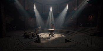 Movie still from “One Piece” (2023), directed by Marc Jobst – Two people are standing in the middle of an altar; Extreme Wide shot, High angle