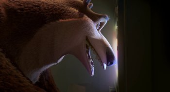 Movie still from “Open Season” (2006), directed by Roger Allers – View of a large animal's teeth; Close Up shot, Over the shoulder angle