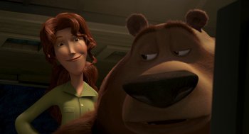Movie still from “Open Season” (2006), directed by Roger Allers – A woman standing next to a brown bear in a room; Close Up shot, Over the shoulder angle