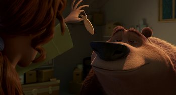 Movie still from “Open Season” (2006), directed by Roger Allers – A person holding a knife over a bear's face; Close Up shot, Over the shoulder angle