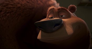 Movie still from “Open Season” (2006), directed by Roger Allers – A brown bear's face with his eyes closed; Close Up shot, Low angle