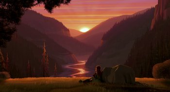 Movie still from “Open Season” (2006), directed by Roger Allers – A woman sitting on a hill overlooking a river at sunset; Extreme Wide shot, Low angle