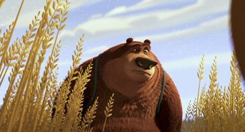 Movie still from “Open Season” (2006), directed by Roger Allers – A brown bear standing next to tall grass; Close Up shot, Low angle