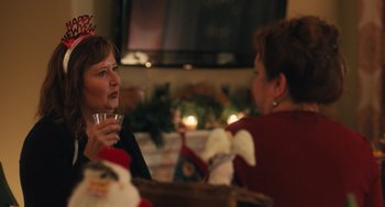 Movie still from “Other People” (2016), directed by Chris Kelly – Two women sitting at a table with a glass of wine; Close Up shot, Over the shoulder angle