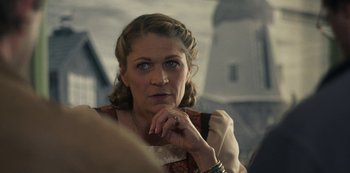 Movie still from “Paddleton” (2019), directed by Alex Lehmann – An older woman is looking into the distance; Close Up shot, Over the shoulder angle