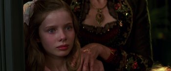 Movie still from “Peter Pan” (2003), directed by P.J. Hogan – A young girl sitting in front of an older woman; Close Up shot, Over the shoulder angle