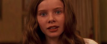 Movie still from “Peter Pan” (2003), directed by P.J. Hogan – A woman's face with brown hair and green eyes; Close Up shot, High angle