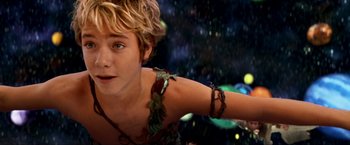 Movie still from “Peter Pan” (2003), directed by P.J. Hogan – A person with a necklace; Close Up shot, High angle