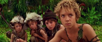 Movie still from “Peter Pan” (2003), directed by P.J. Hogan – A group of young boys dressed like peter pan; Close Up shot, High angle
