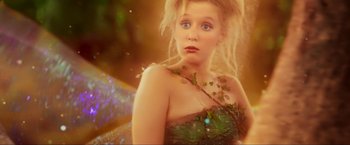 Movie still from “Peter Pan” (2003), directed by P.J. Hogan – A beautiful young blonde woman wearing a green dress; Close Up shot, Low angle