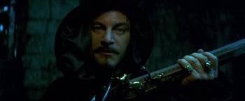 Movie still from “Peter Pan” (2003), directed by P.J. Hogan – A person wearing a hat; Close Up shot, Low angle