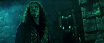 Movie still from “Peter Pan” (2003), directed by P.J. Hogan – A person with long curly hair; Close Up shot, Low angle