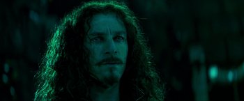 Movie still from “Peter Pan” (2003), directed by P.J. Hogan – A person with long curly hair; Close Up shot, Low angle