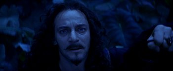 Movie still from “Peter Pan” (2003), directed by P.J. Hogan – A person with long black hair; Close Up shot, Over the shoulder angle