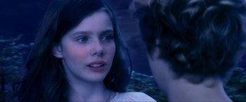 Movie still from “Peter Pan” (2003), directed by P.J. Hogan – A young woman is looking at a young man; Close Up shot, Over the shoulder angle