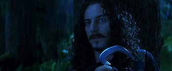 Movie still from “Peter Pan” (2003), directed by P.J. Hogan – A person holding a pair of scissors; Close Up shot, Over the shoulder angle