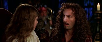 Movie still from “Peter Pan” (2003), directed by P.J. Hogan – A young girl and a man in a pirate costume; Close Up shot, Over the shoulder angle