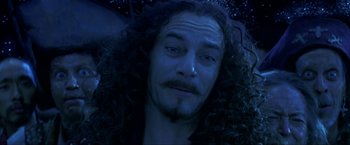 Movie still from “Peter Pan” (2003), directed by P.J. Hogan – A person with long curly hair; Close Up shot, Low angle