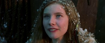 Movie still from “Peter Pan” (2003), directed by P.J. Hogan – A person with snow on her head; Close Up shot, Low angle